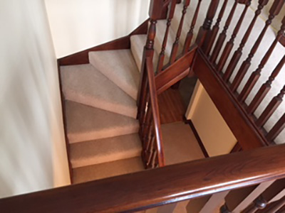 Beige carpet on stairs