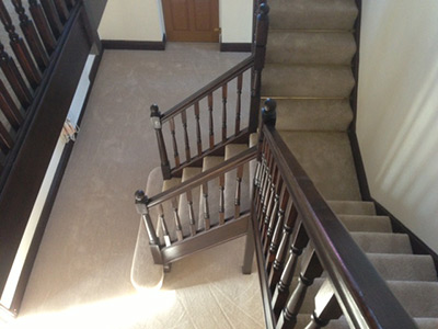 Light coloured carpet on gallery stairs and landing